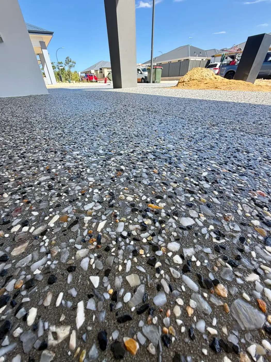 Close view of a mixed stone exposed aggregate blend after washing back, Perth