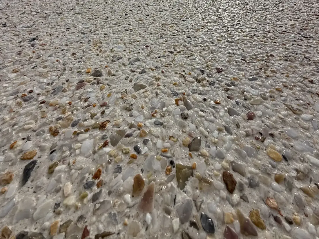 Close view of the stone standing proud of the surface