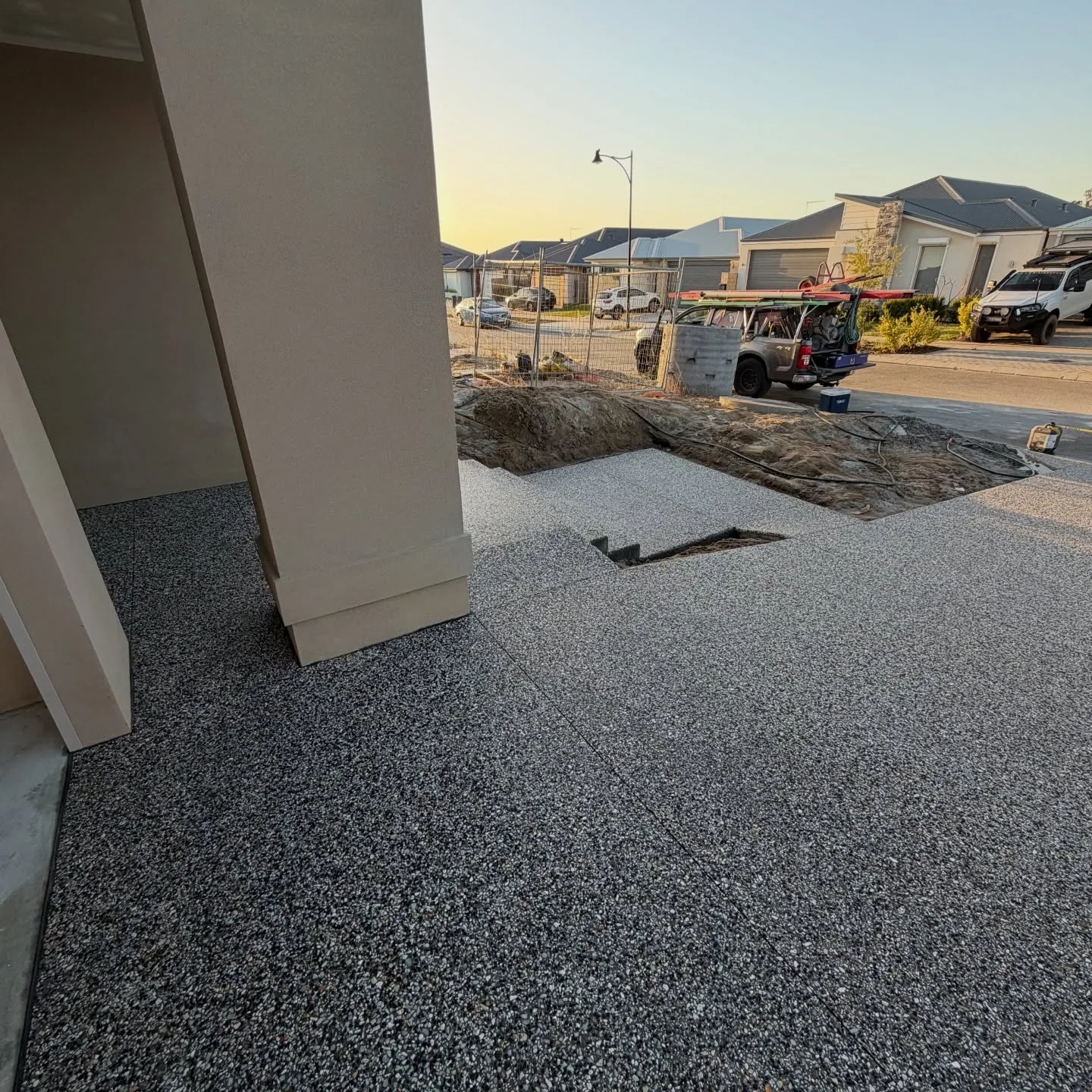 Exposed aggregate house surround poured against a new Perth build