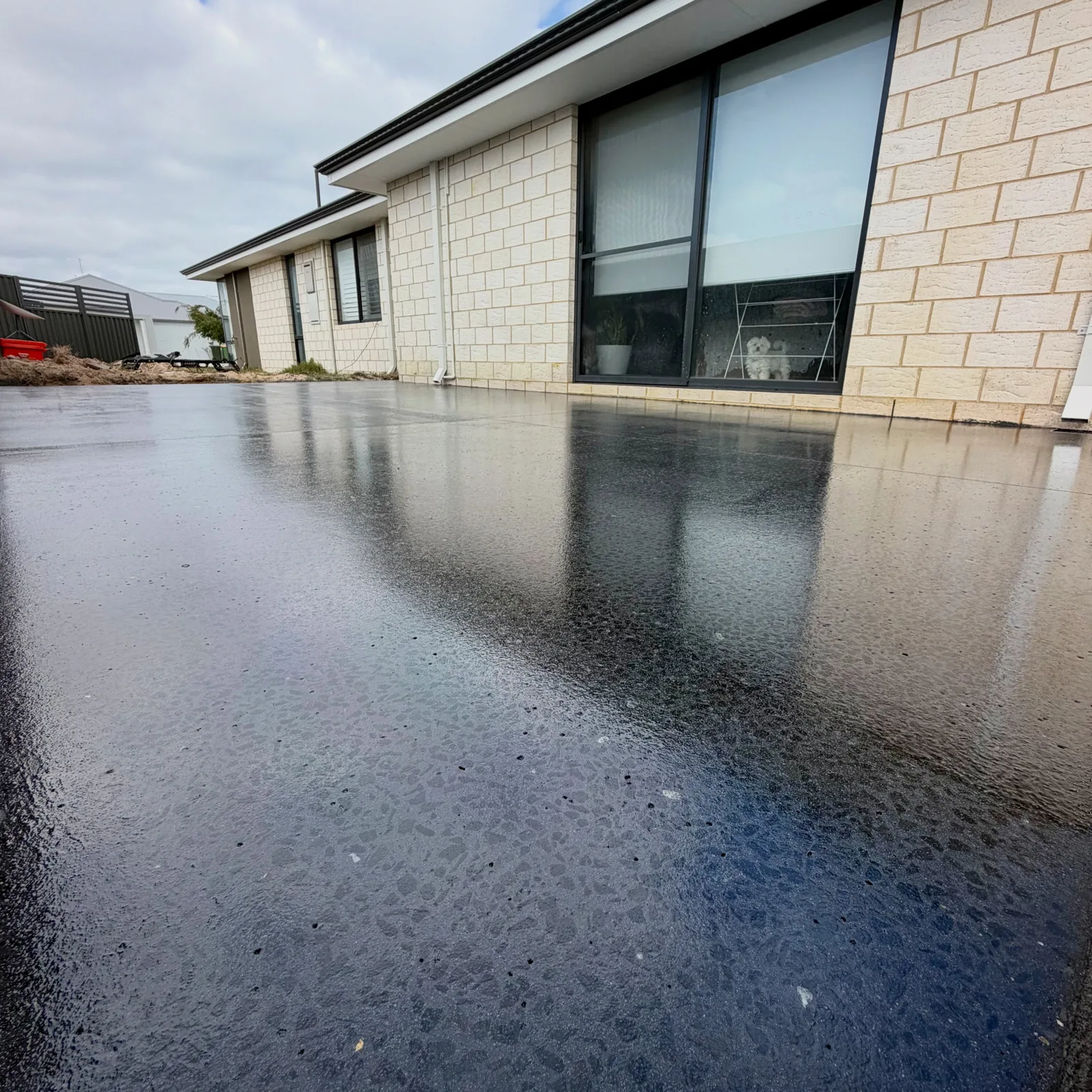 Honed Blackwood concrete finish with wet-look sheen, Perth