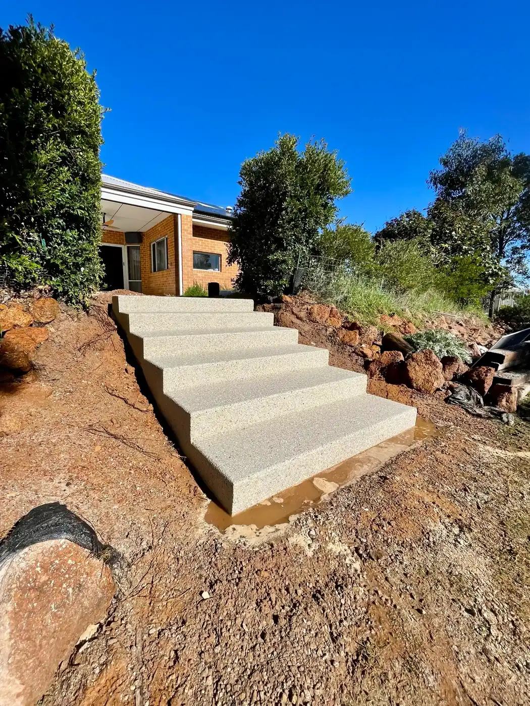 New exposed aggregate garden steps poured on a sloping block, Perth