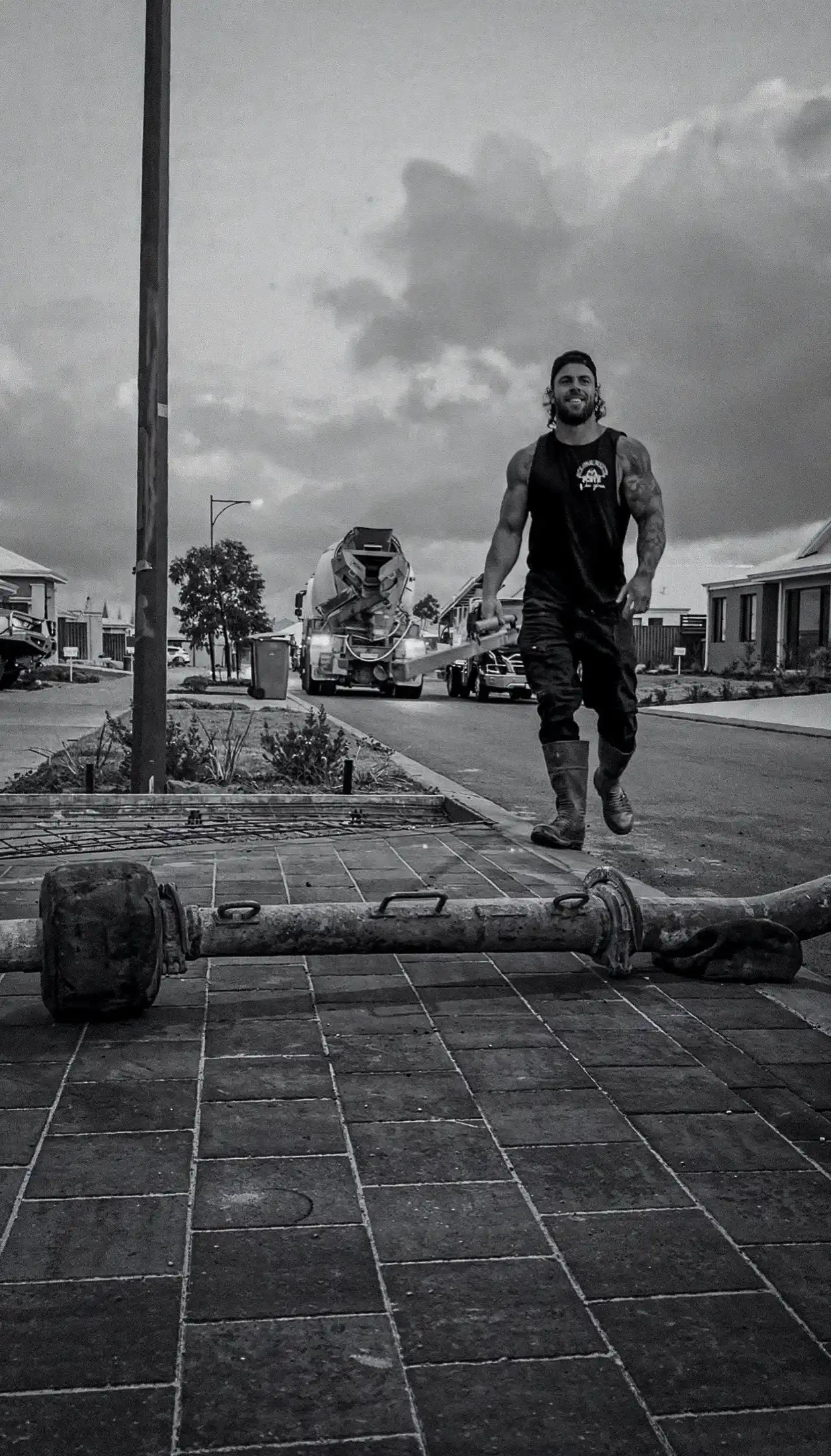 Only Concrete owner Nathan Perry walking from the concrete truck on a Perth job